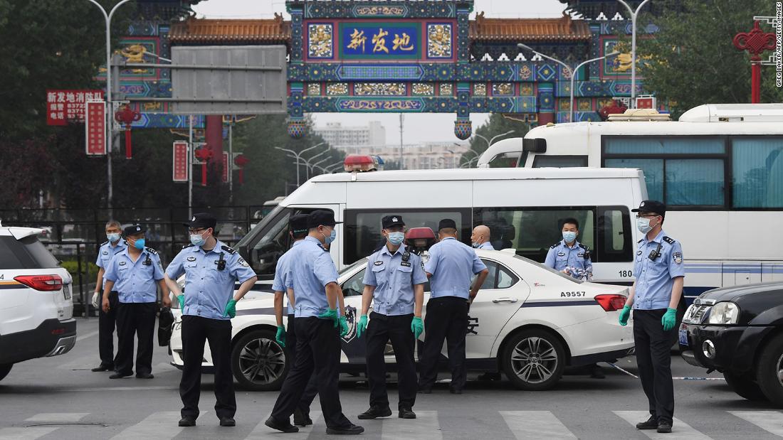 China's new coronavirus outbreak sees Beijing adopt 'wartime' measures