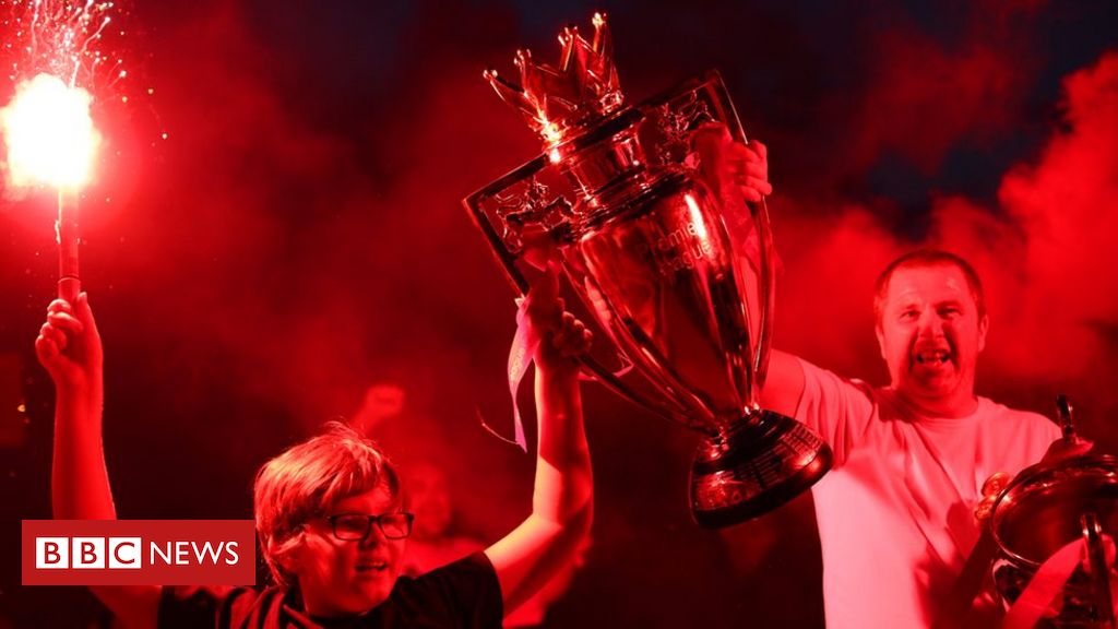 Liverpool fans flock to Anfield to celebrate Premier League title