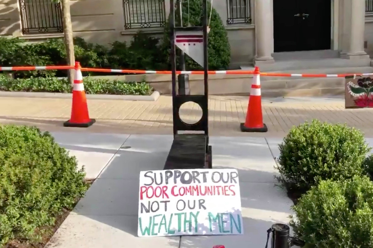 Protesters set up guillotine in front of Jeff Bezos' DC home