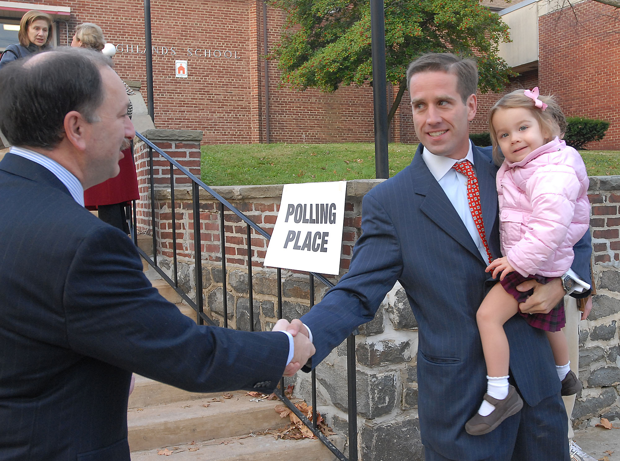Delaware attorney general candidate Beau Biden greets a voter after placing his vote in 2006