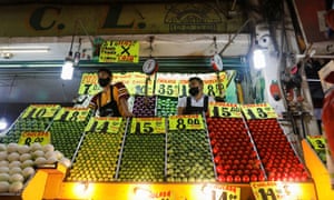 Vendors are pictured at Central de Abastos, one of the world’s largest wholesale market complexes, as the coronavirus outbreak continues in Mexico City, Mexico 13 July 2020.