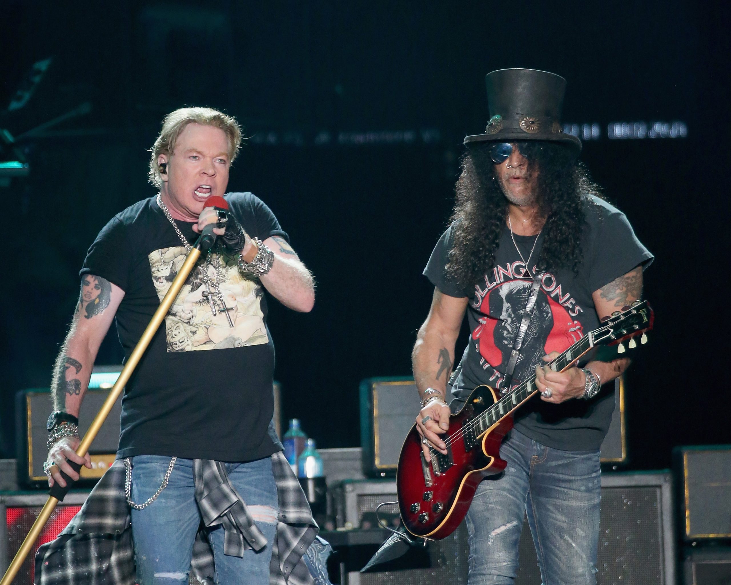 AUSTIN, TEXAS - OCTOBER 04:  Axl Rose (L) and Slash of Guns N' Roses perform in concert during weekend one of the 2019 ACL Fest at Zilker Park on October 4, 2019 in Austin, Texas.  (Photo by Gary Miller/Getty Images)