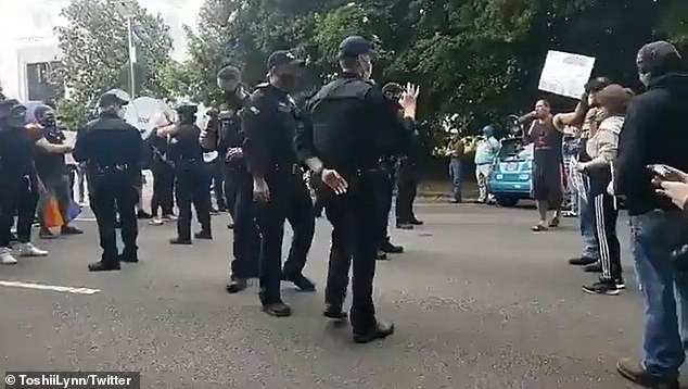 An officer with The Department of Oregon State Police was accused of making a white power hand gesture during a Black Lives Matter demonstration in Salem, Oregon