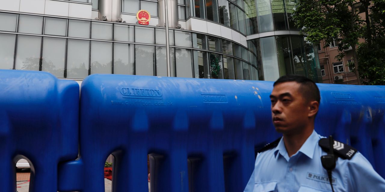 Overnight, a Hong Kong Hotel Is Transformed Into China’s State Security HQ