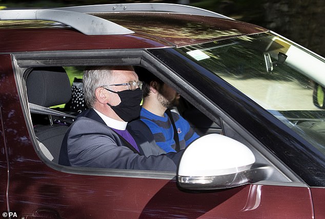 Rev Kenneth MacKenzie wearing a protective face mask arrives at Crathie Kirk ahead of the Sunday Service where the monarch usually attends during her summer break at Balmoral
