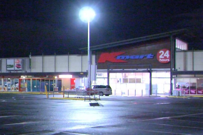 An empty carpark at a 24-hour Kmart store.