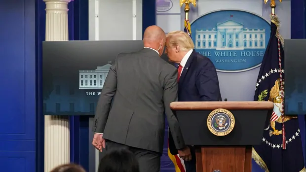 Trump abruptly escorted out of briefing room after security incident outside