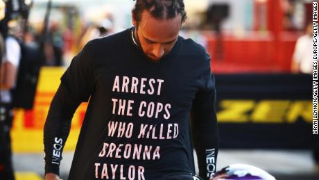 Hamilton wears a shirt in tribute to Taylor during the Grand Prix on Sunday. 