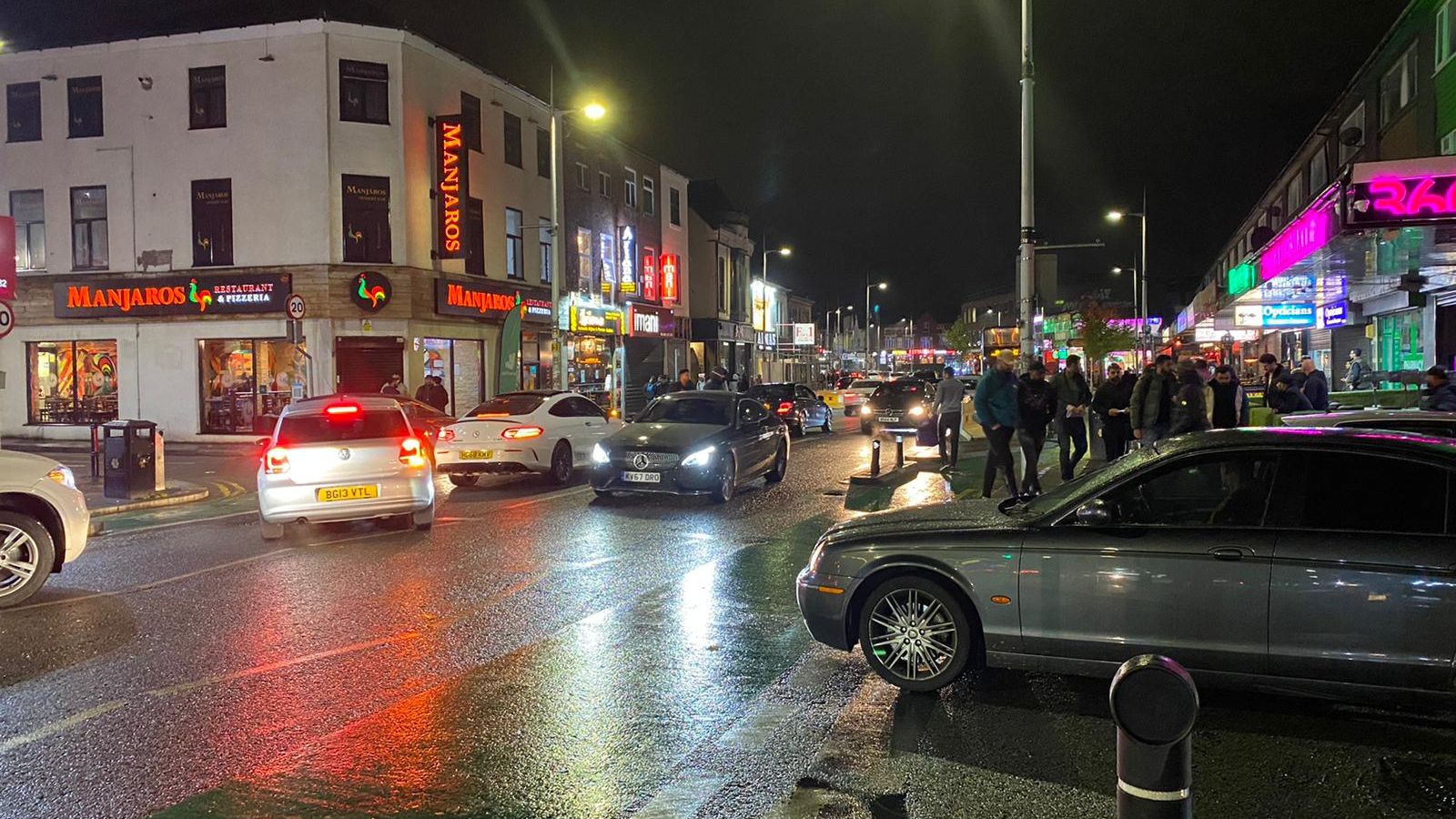 Bars and restaurants on Manchester's so-called Curry Mile were full on Friday night