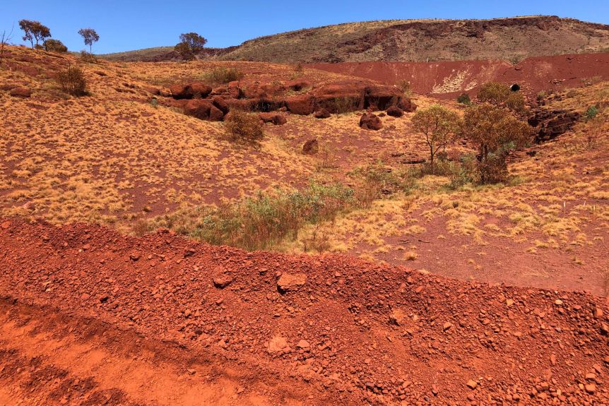 Rocky red hills in the Australian desert.