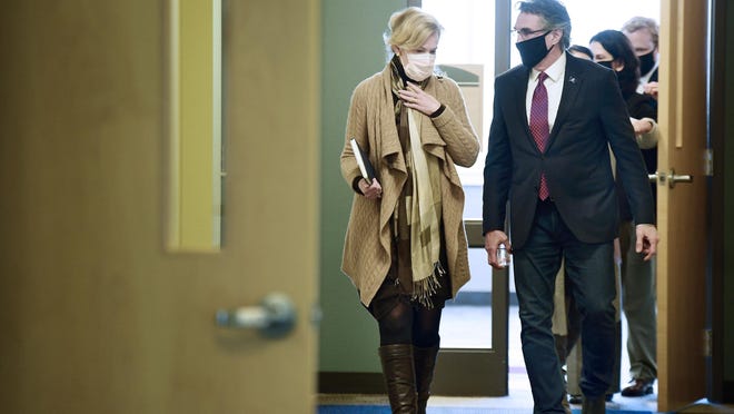Dr. Deborah Birx, the White House coronavirus response coordinator, is walking with Governor Doug Borghum after holding a roundtable discussion with state and local government and medical leaders on the Bismarck State College campus on Monday.
