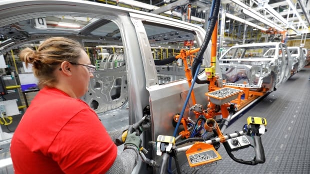 GM will again build pickup trucks in Oshawa if an initial deal with the union is approved