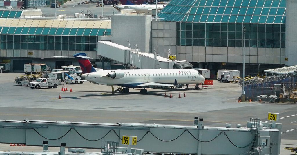 Two passengers, a dog slipped off the moving plane at LaGuardia Airport