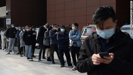On October 29, people queued at a Beijing hospital to get tested for the Govt-19 coronavirus.