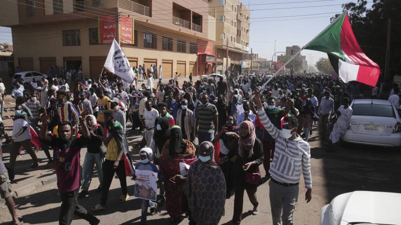 At least four people have been shot dead in mass protests against coup plotters in Sudan