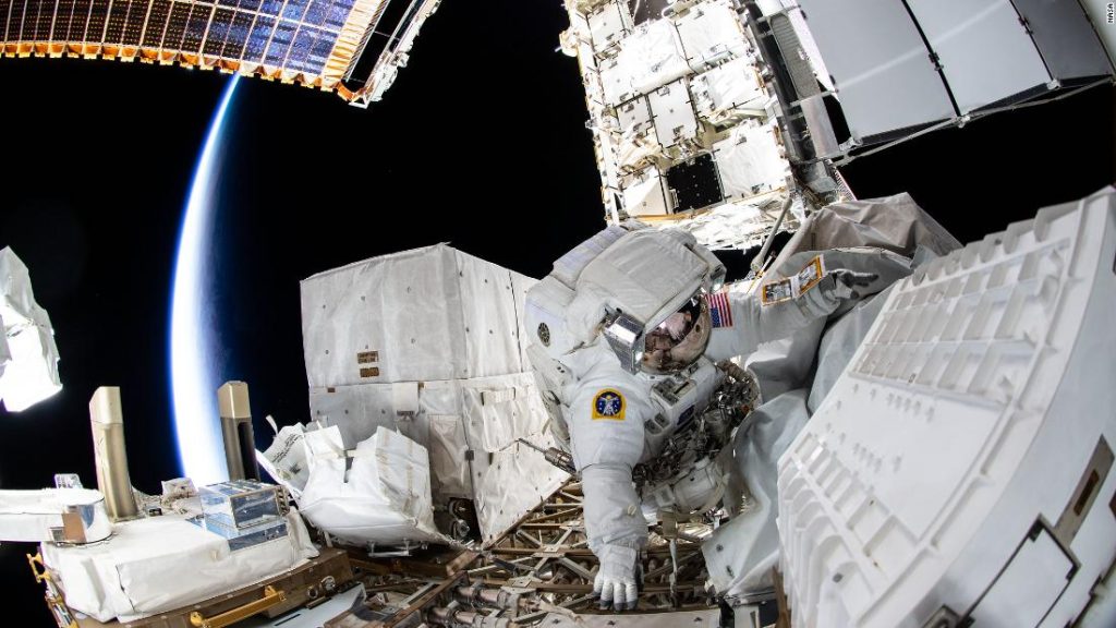 NASA astronauts conduct spacewalks to improve space station power supplies