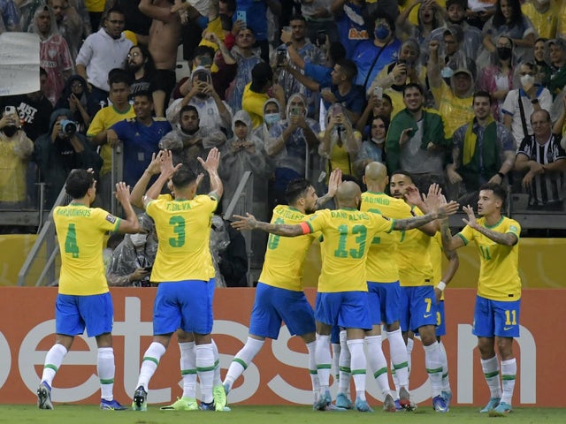 Brazilian Ravenha celebrates his first goal with his teammates on February 1, 2022