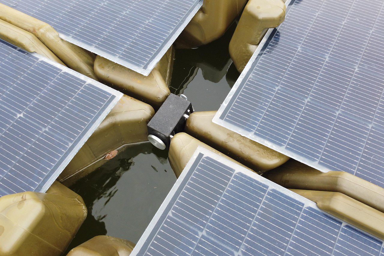 SolOcean PV system on a gravel pond, eight PV units on the water