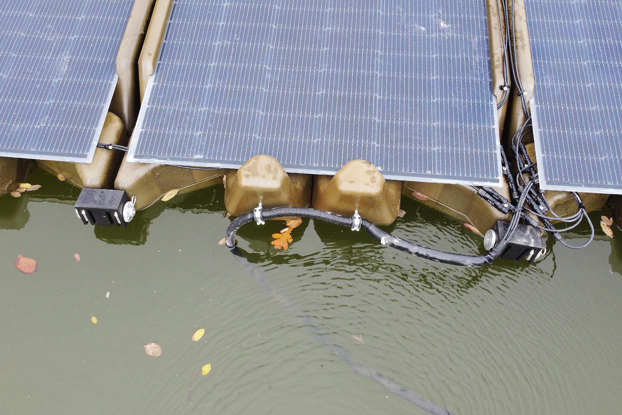 SolOcean PV system on a gravel pond, eight PV units on the water