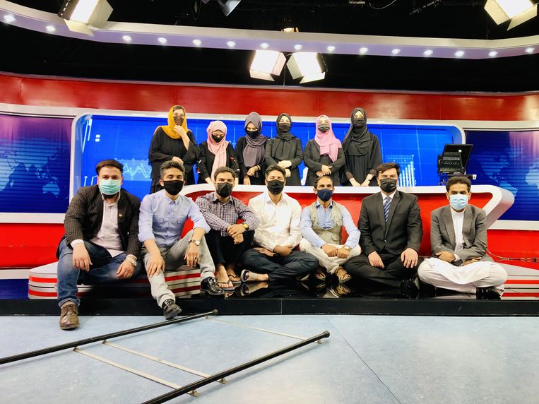 Afghan TV presenters cover their faces in solidarity with their female colleagues