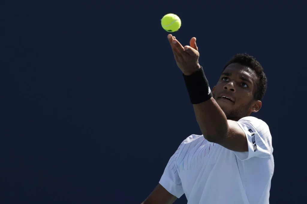 Felix Auger-Aliassime crosses into the French Open