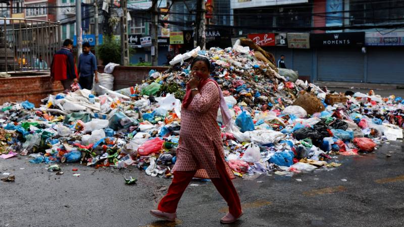Kathmandu residents and tourists are bothered by piles of smelly garbage