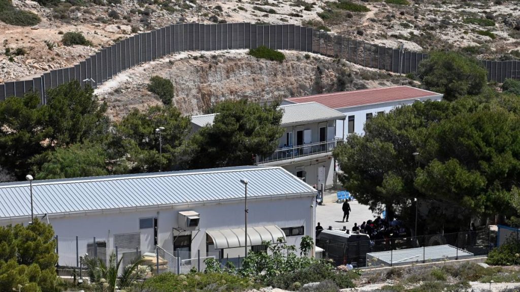 Italy opens crowded reception center in Lampedusa