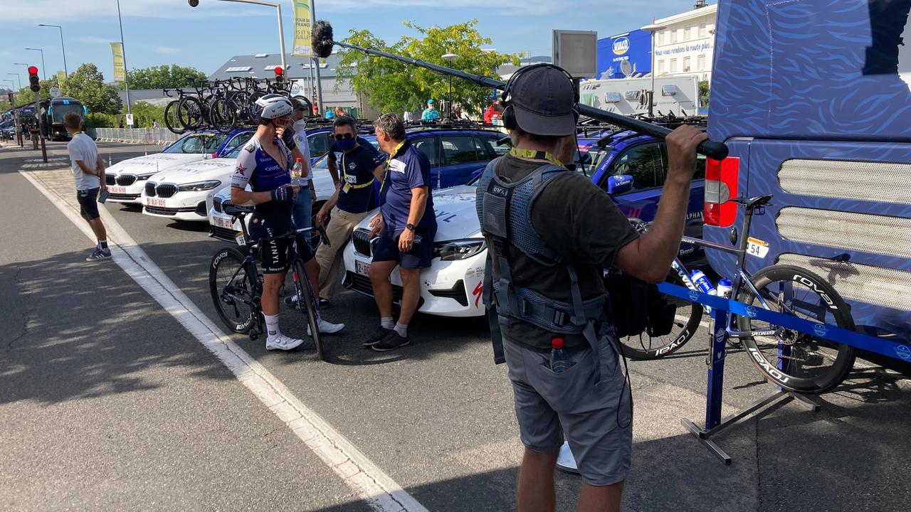 A Netflix series sound engineer catches Quick-Step Alpha rider Vinyl Yves Lampaert as soon as he gets on the team bus after stage 13.