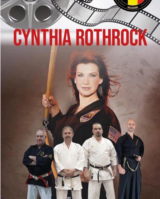 Jean-Pierre Van Frey, Patrick Mies, Chris Tonin, Muhammed Amhall and Quinn Entbroeks of IMAF in front of the banner of American actress and karate champion Cynthia Rothrock. 