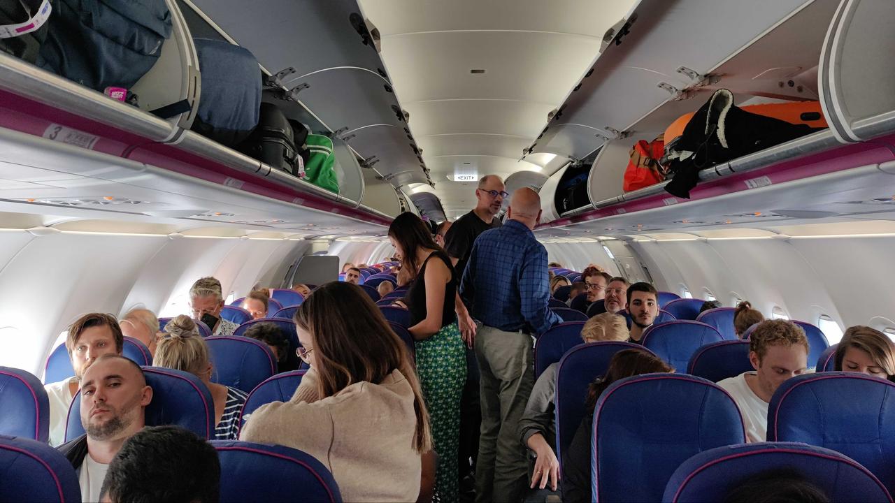 Passengers are asked to remain in their seats.