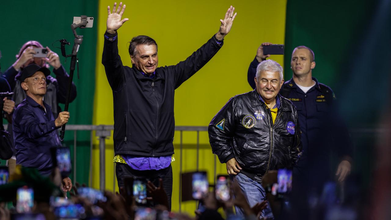 Incumbent President Jair Bolsonaro receives applause at a rally in the run-up to the elections.