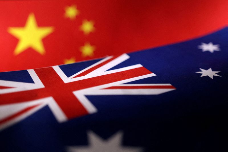 FILE PHOTO: Illustration shows printed Chinese and Australian flags