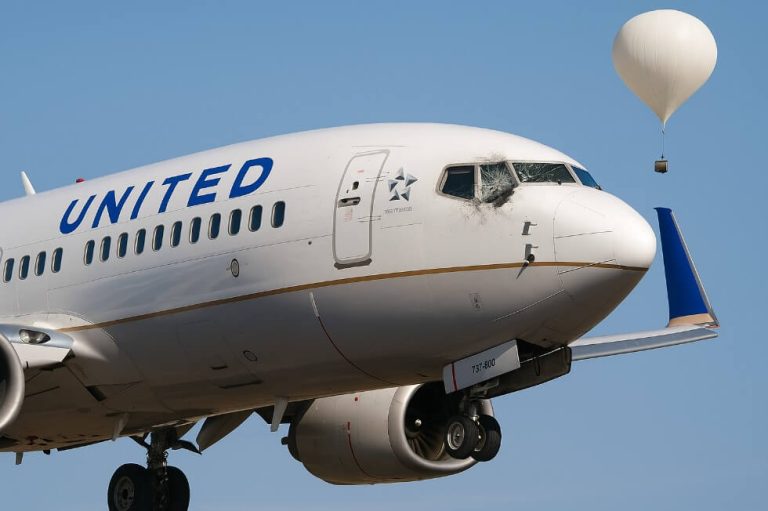 United Airlines Jet Damaged After Suspected Weather Balloon Collision; Pilot Injured
